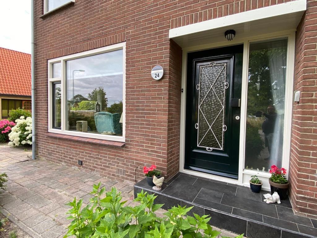 Huis Bij Het Water Met Sloepje Jutrijp ภายนอก รูปภาพ