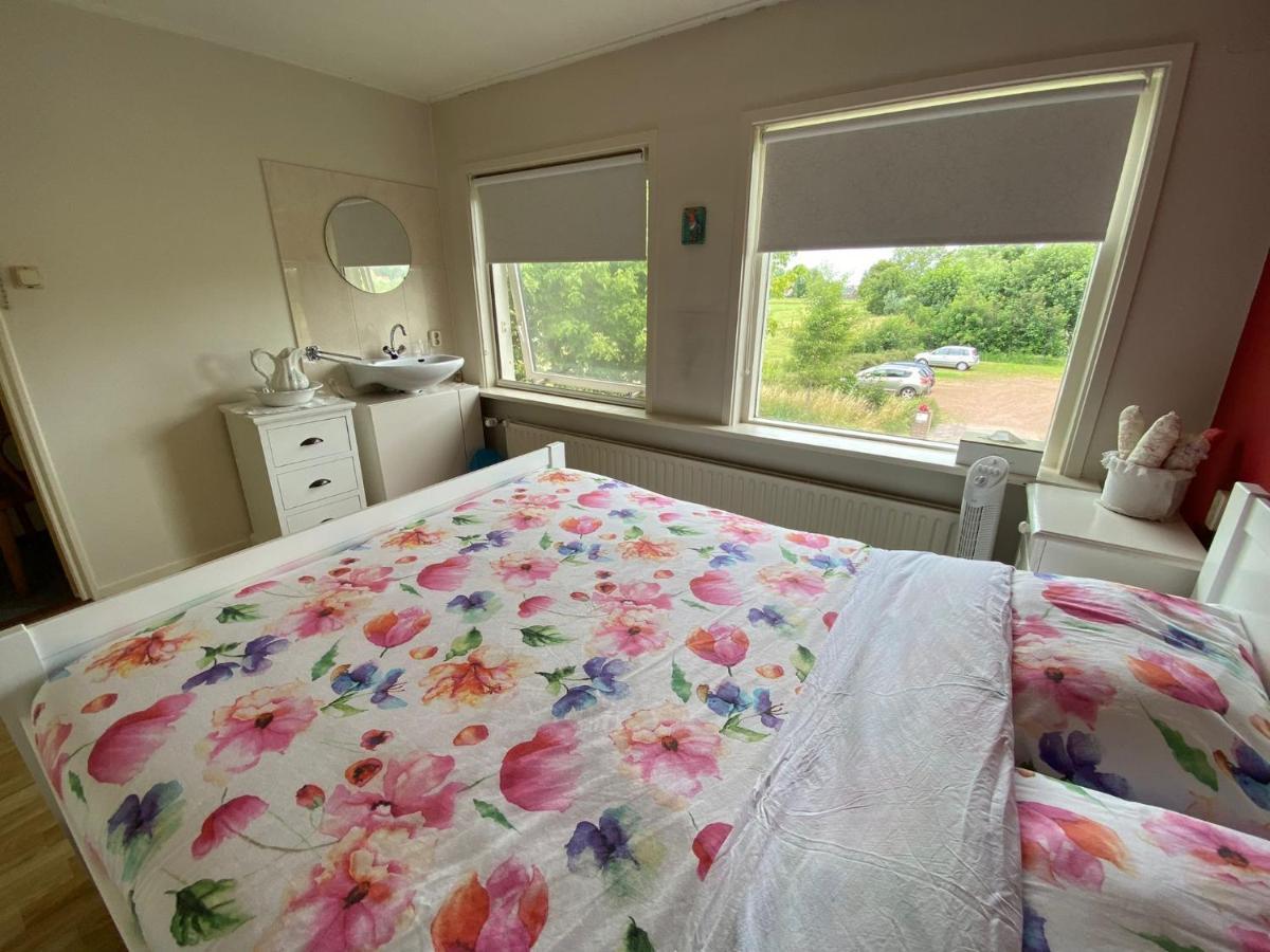 Huis Bij Het Water Met Sloepje Jutrijp ภายนอก รูปภาพ