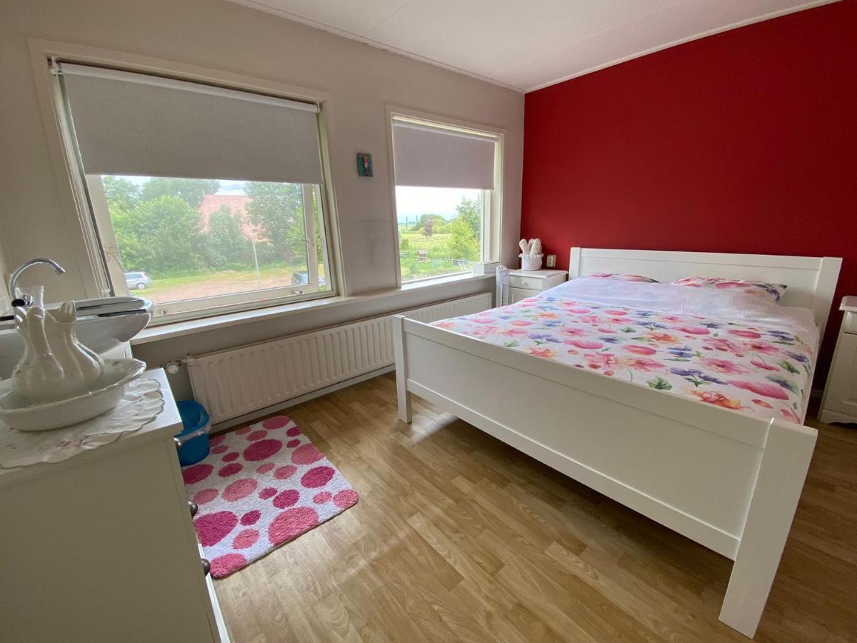 Huis Bij Het Water Met Sloepje Jutrijp ภายนอก รูปภาพ