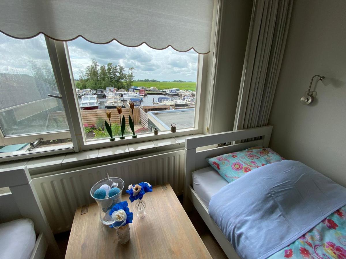 Huis Bij Het Water Met Sloepje Jutrijp ภายนอก รูปภาพ
