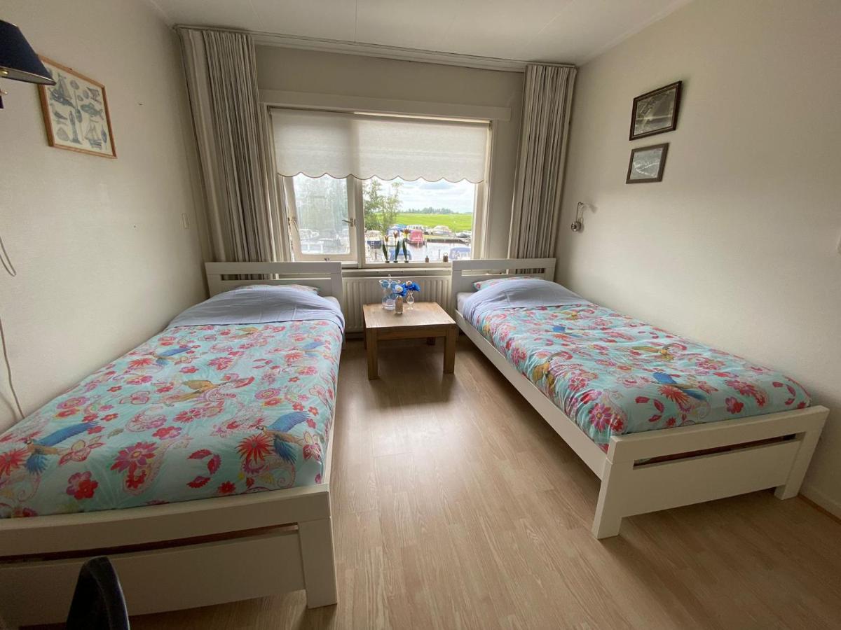 Huis Bij Het Water Met Sloepje Jutrijp ภายนอก รูปภาพ